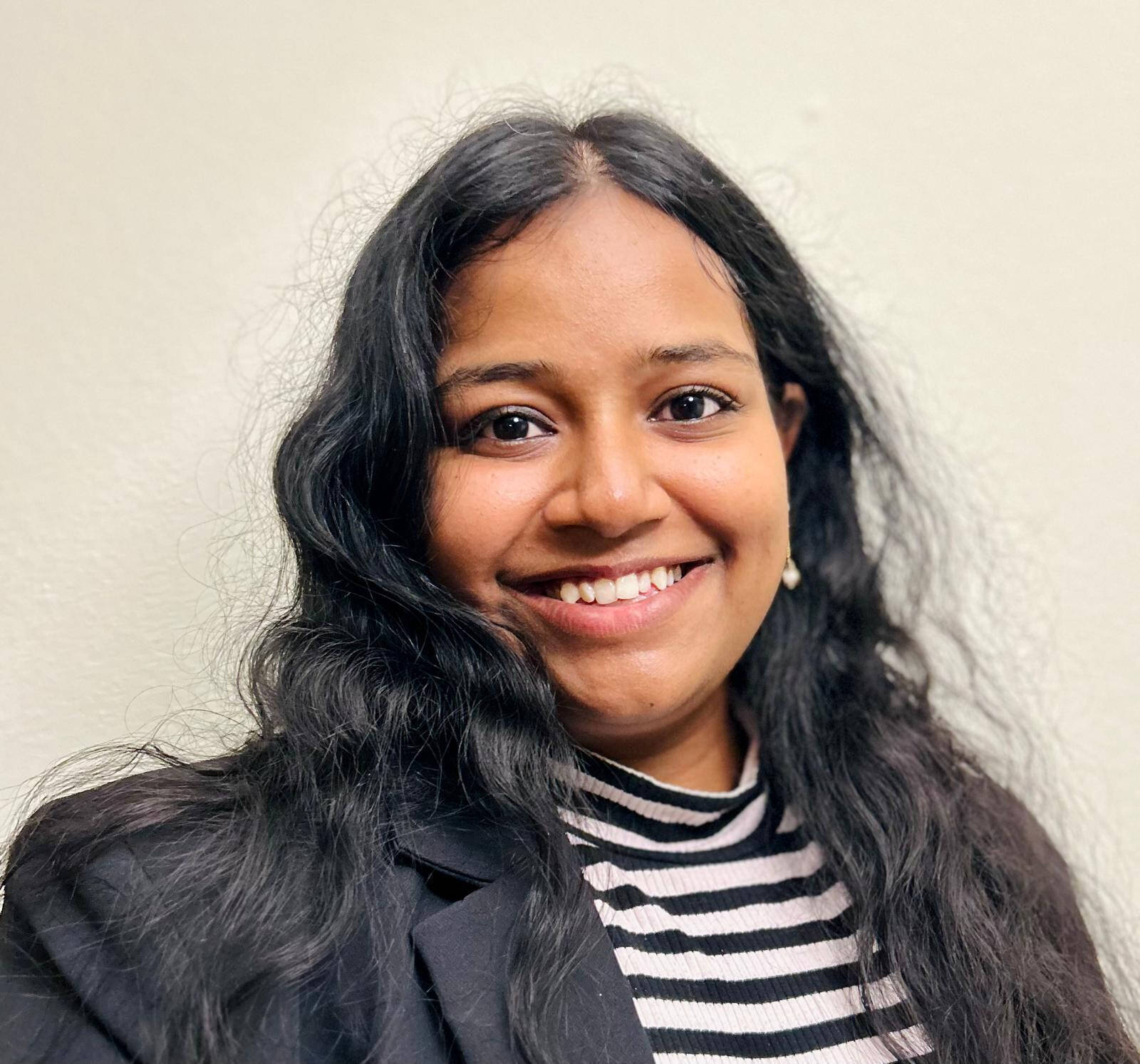 Pooja smiling